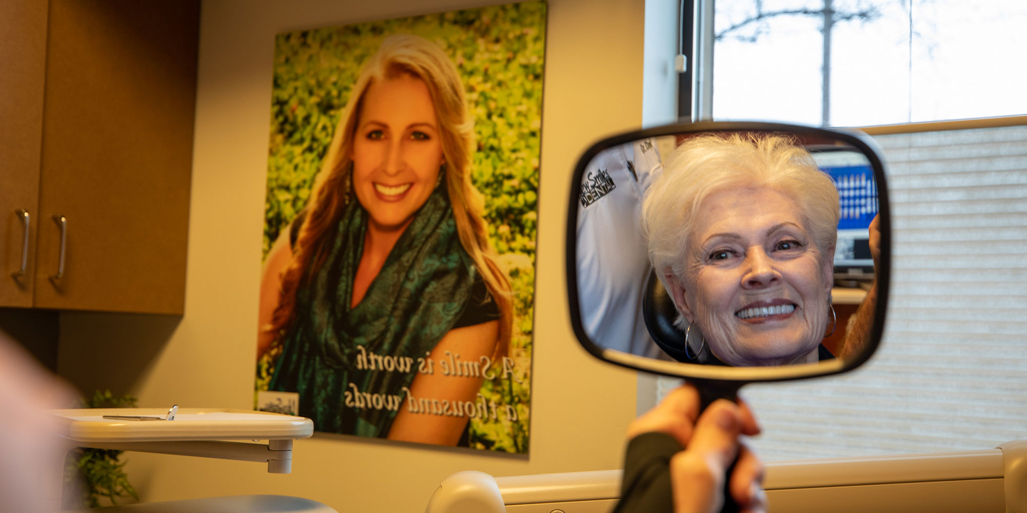 Patient smiling glamorously after their dental procedure