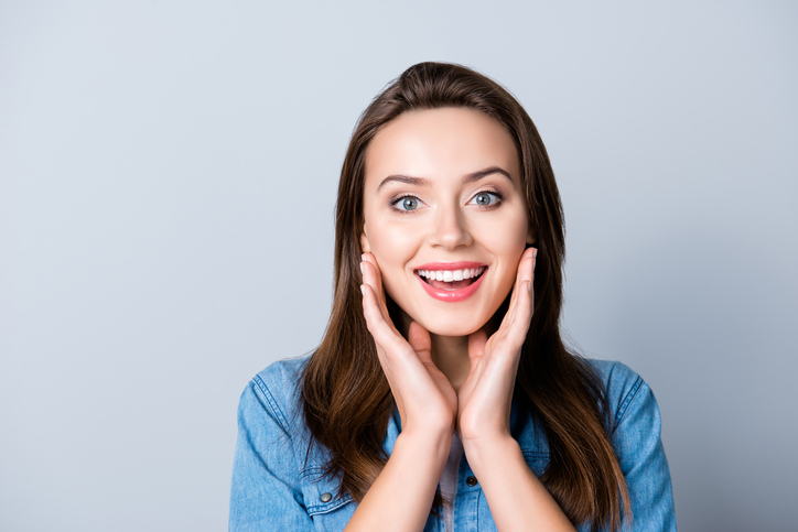 Woman in blue top smiling